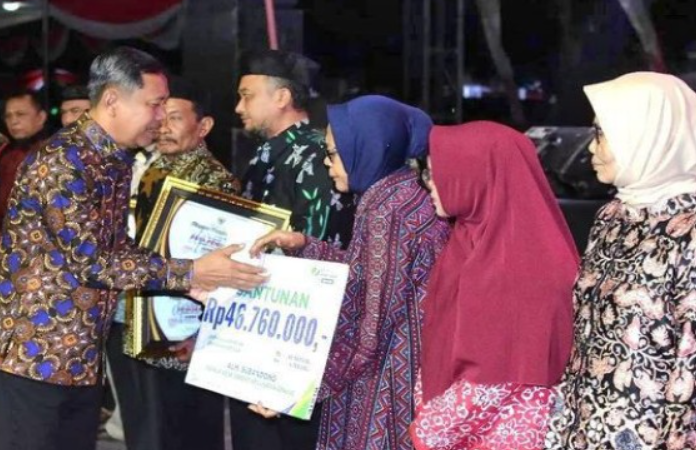 Pemkab Ngawi Berikan Santunan BPJS Ketenagakerjaan Kepada 5 Ahli Waris Ekosistem Desa